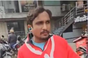 Zomato Worker Over Santa Costume