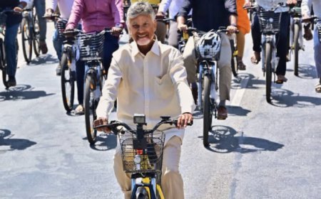 Naidu Greets Cyclists On Bicycle