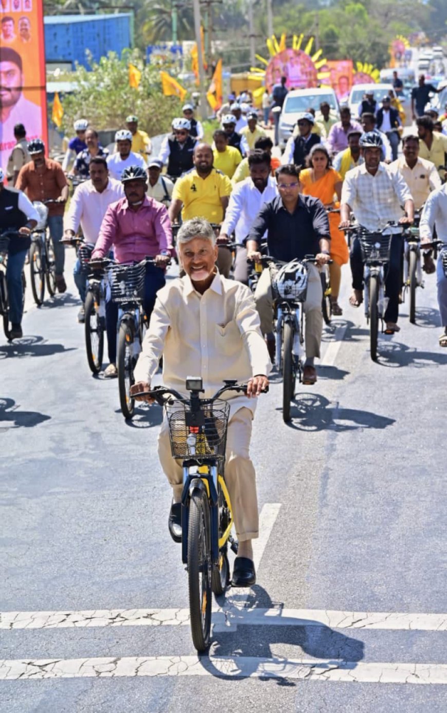 Naidu Greets Cyclists On Bicycle